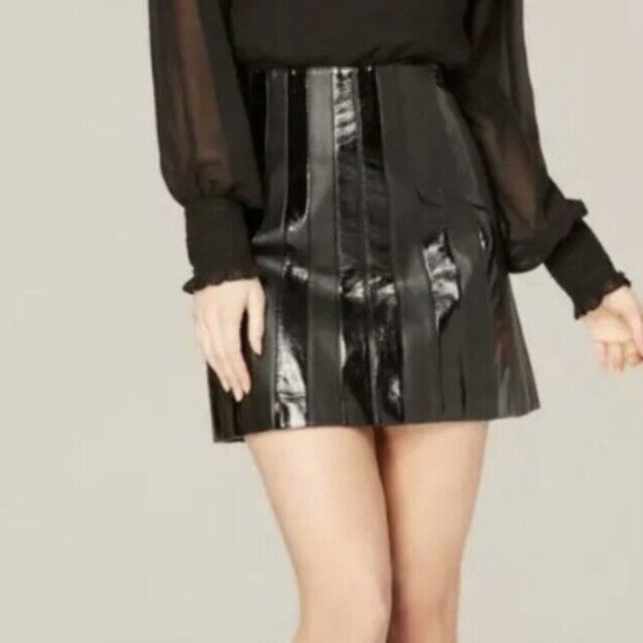 bebe Dresses & Skirts - NWT Bebe Combo Mini Skirt Faux
Leather/Patent Mix